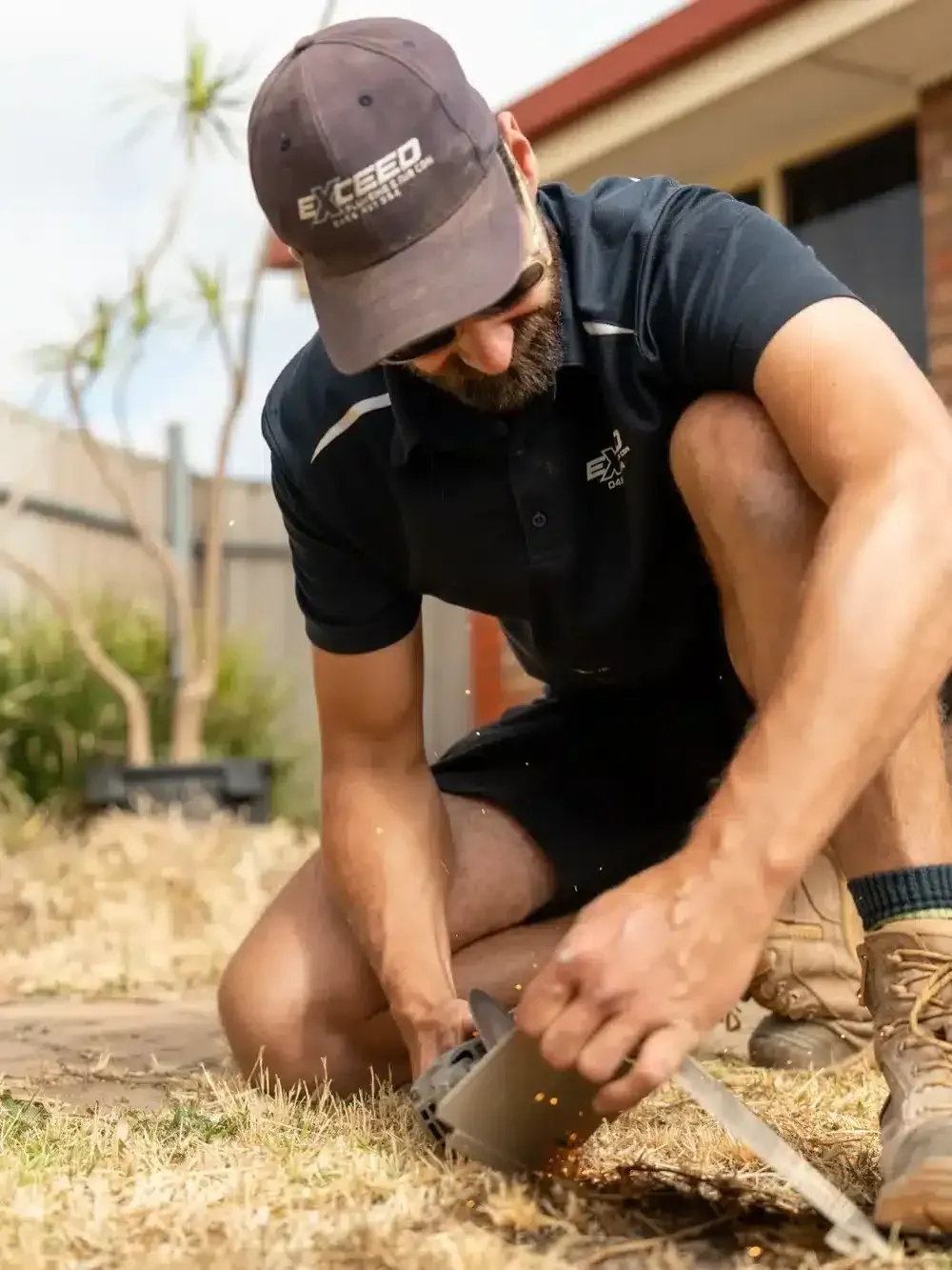 A Redwood Park plumber at work on a job